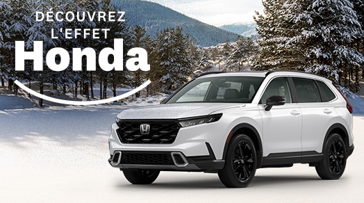 Véhicule Honda sur forêt en hiver. Le logo de << Découvrez l'effet Honda >> placée en haut à gauche.