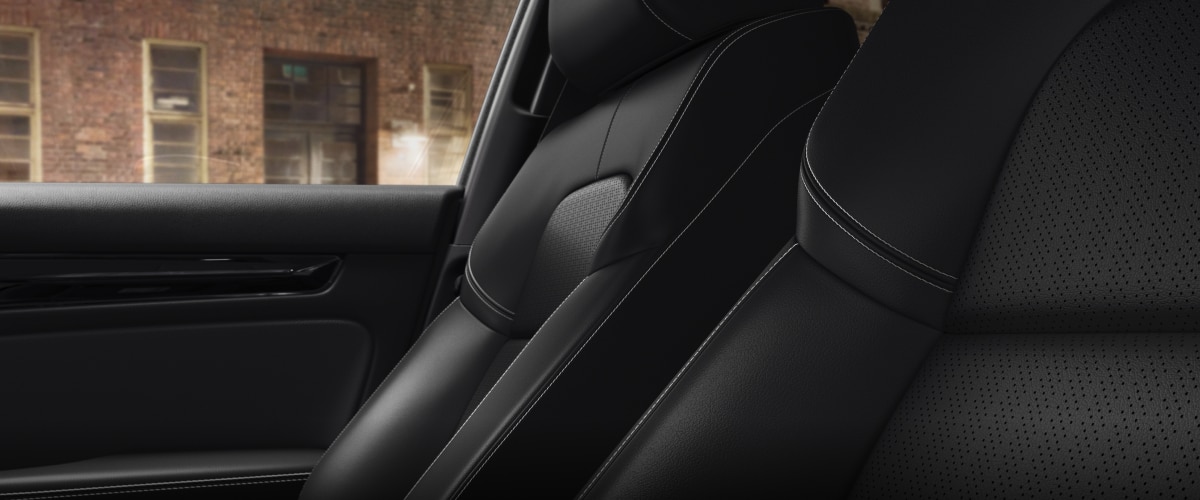 Interior closeup of seats in a hatchback.