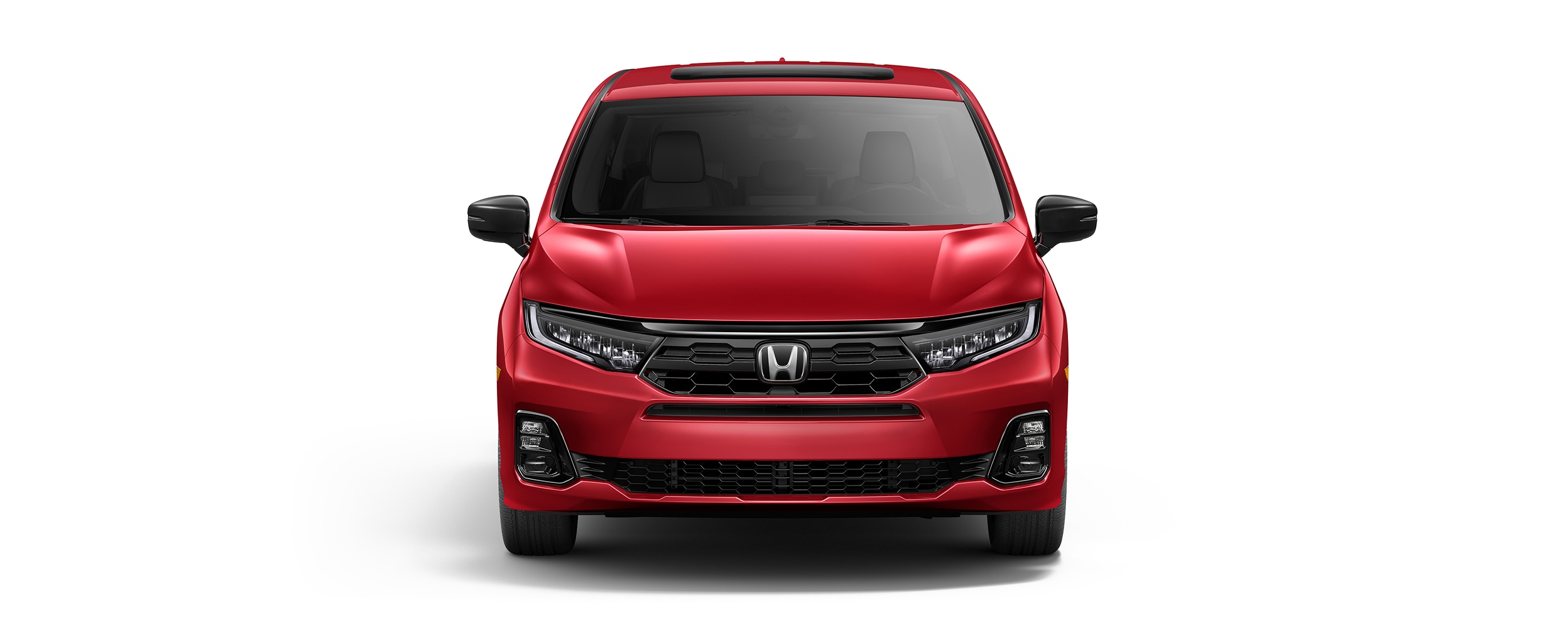 Wide front view of red Odyssey on white space.