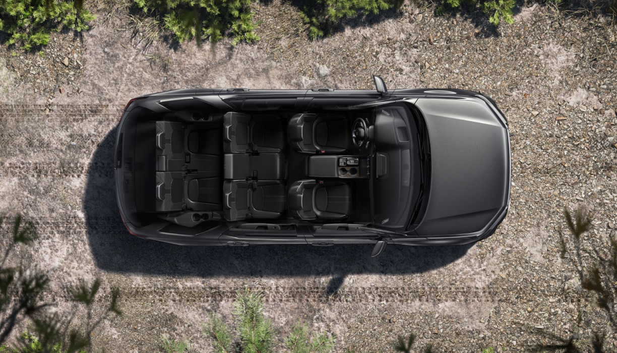 Top-down view of a grey Pilot with the roof removed, revealing its 7-passenger seating layout.