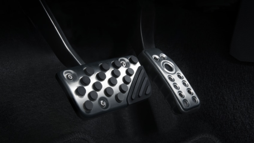 Close up of brake and gas pedals.