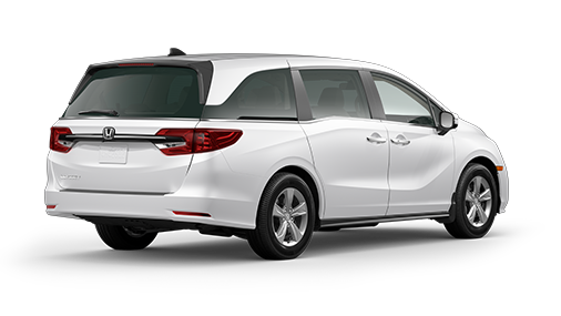 ¾ driver side rear facing view of 2023 Odyssey EX model in Platinum White Pearl colour