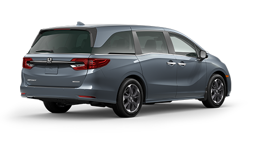 ¾ driver side rear facing view of 2023 Odyssey Touring model in Sonic Grey Pearl colour
