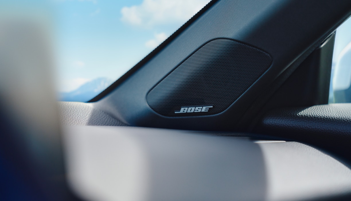 Closeup of BOSE speaker on the front passenger side.