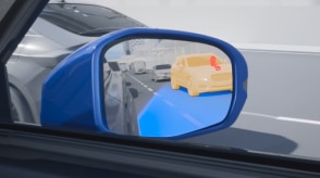 Computer-generated illustration with an interior view of the side mirror. In the mirror we see the blind spot alert signal is illuminated and blue sensor waves emitting from the prologue, detecting a car.