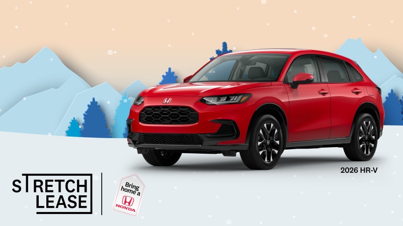 A red 2026 HR-V EX-L with snowy mountains and trees in the background.